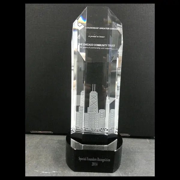Custom engraved faceted crystal obelisk award for Chamber of Commerce recognition.