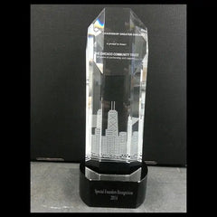 Custom engraved faceted crystal obelisk award for Chamber of Commerce recognition.
