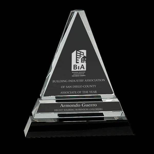 Clear crystal triangle trophy with laser-etched city skyline on black base