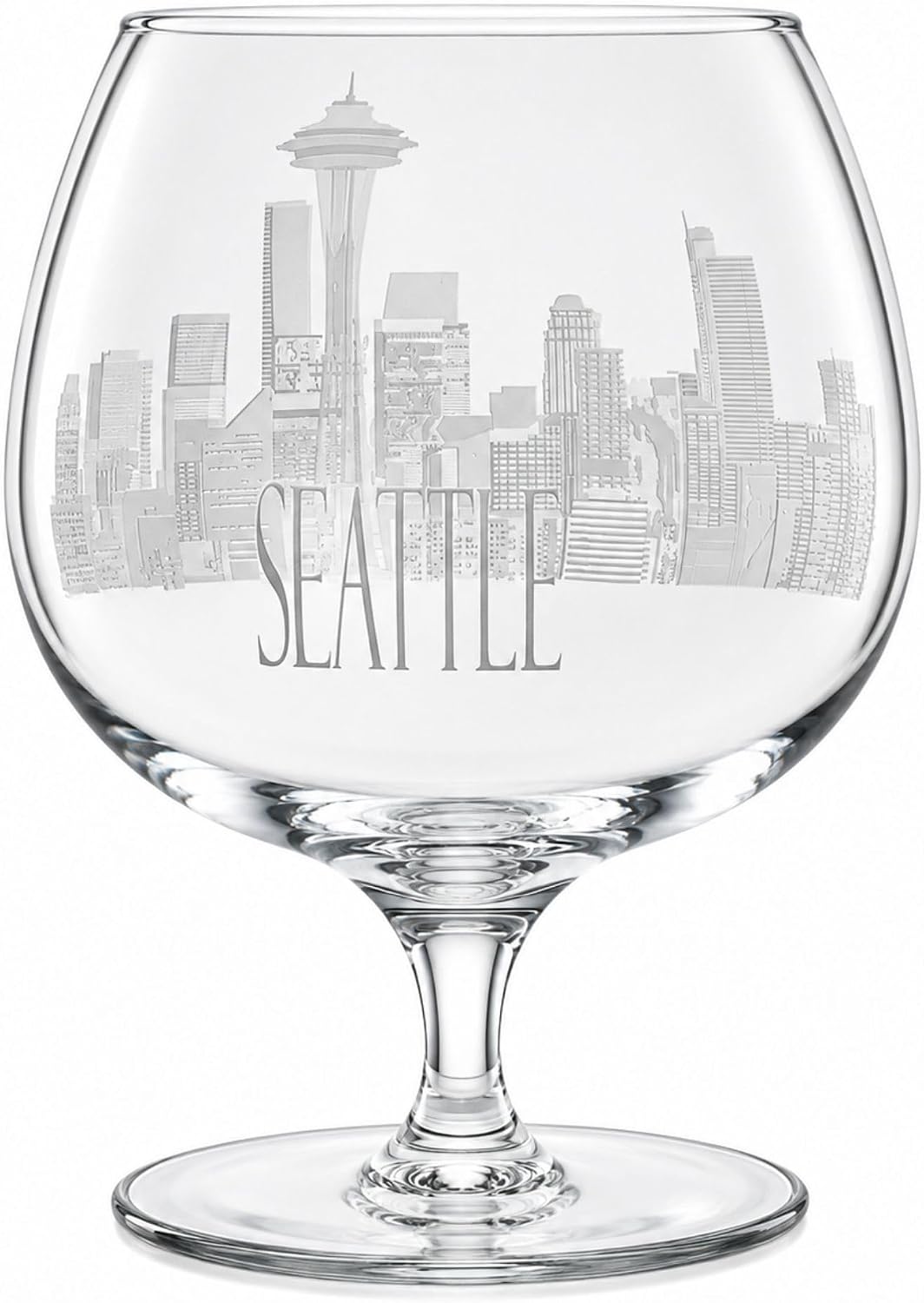 Clear glass snifter wine glass featuring an etched grayscale Seattle skyline and the word 'SEATTLE' on the bowl, shown on a white background.