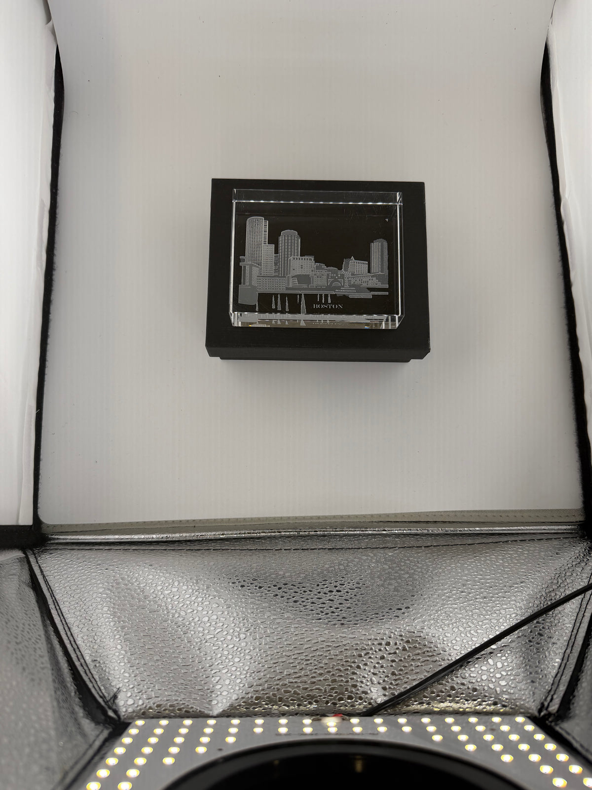 Master-crafted Crystal House paperweight with detailed sand-carved city silhouette