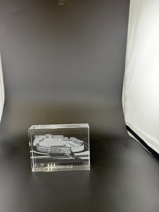 Sand-carved crystal paperweight featuring intricate city skyline engraving by Crystal House artisans