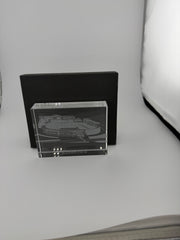 Close-up of deep hand-carved skyline details on premium crystal paperweight