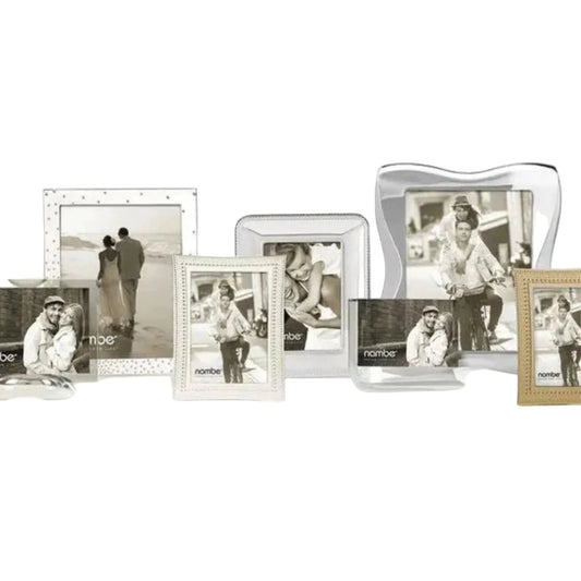 Collection of photo frames with family pictures on a white background